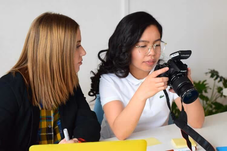 Two girls with a camera