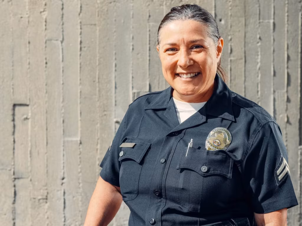 a smiling police officer being helpful after long-distance moving