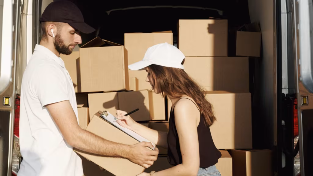 A cross-country moving company loading a truck