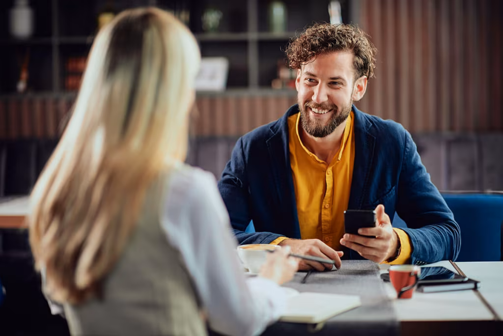 an employee and boss discussing moving cross-country for work