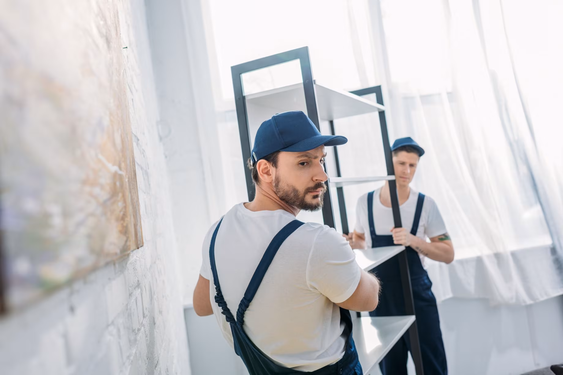 Cross-country movers relocating furniture
