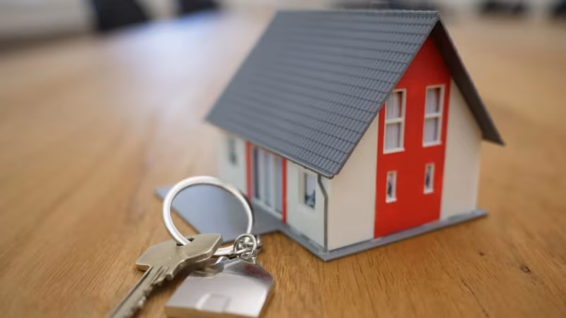 Modern small residential house exterior representing local residential moving services.