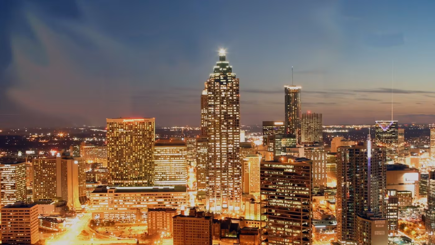 Downtown Atlanta's towers lit at dusk