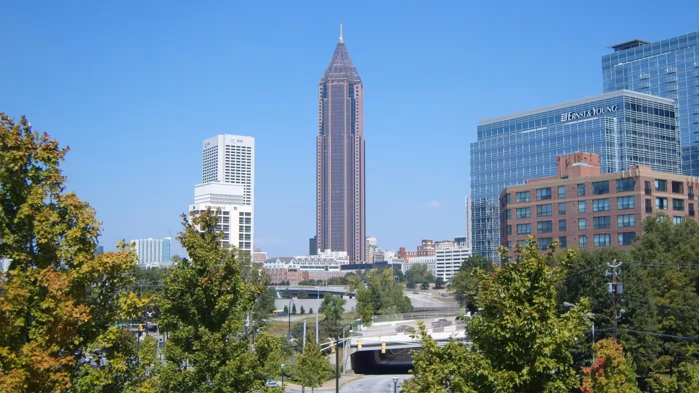 Atlanta's tallest tower rising above the trees on a clear day