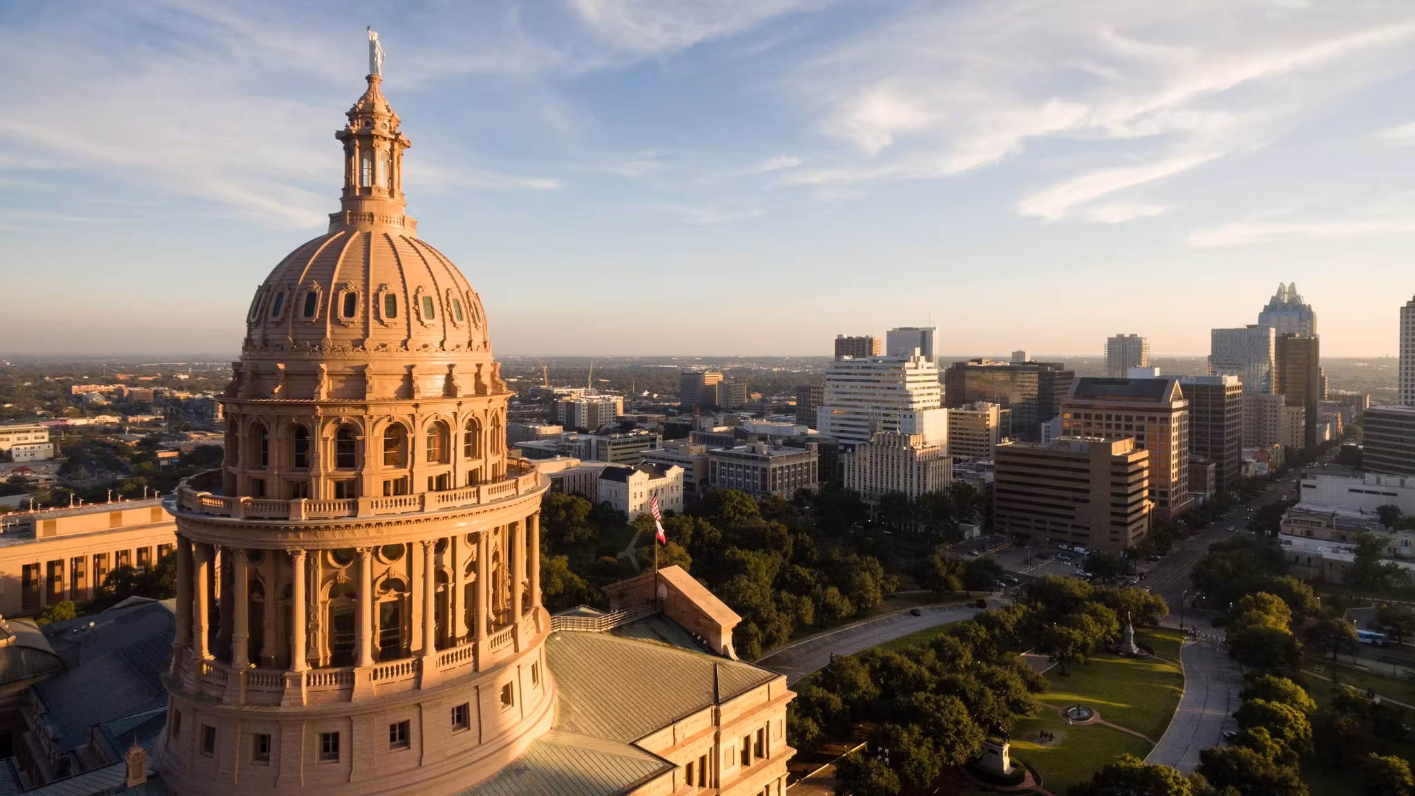 The Texas Capitol dome in Austin with the downtown towers behind it