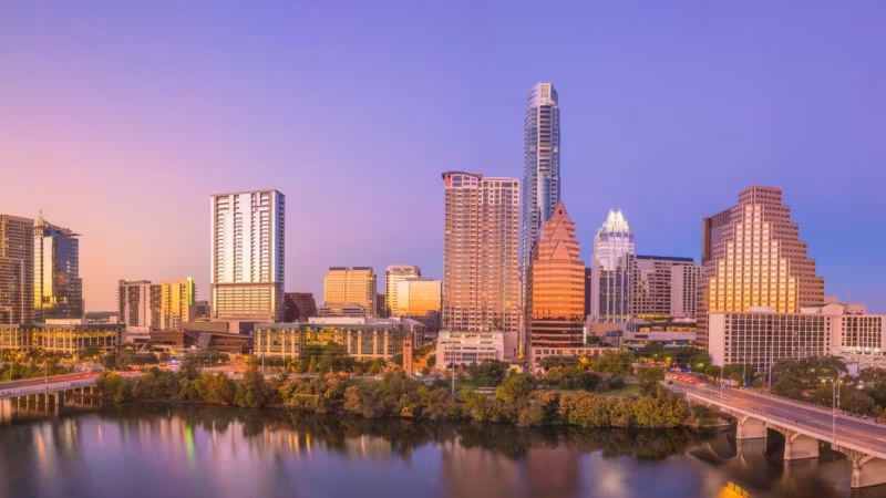 The Austin skyline above the river at dusk
