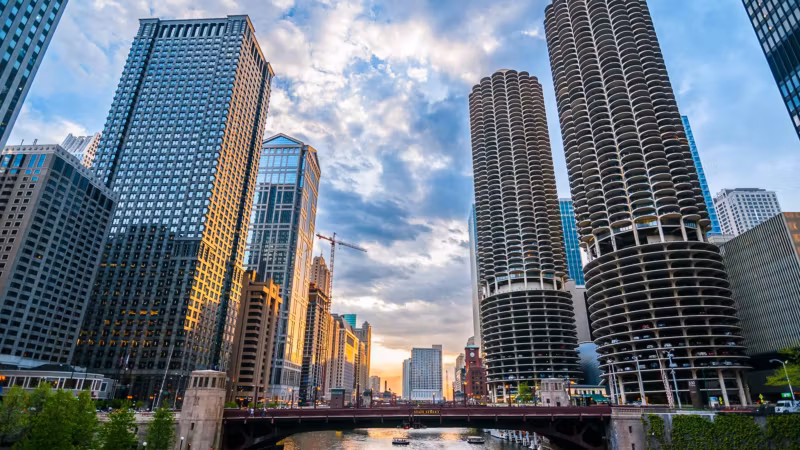 The round Marina City towers rising above the Chicago River