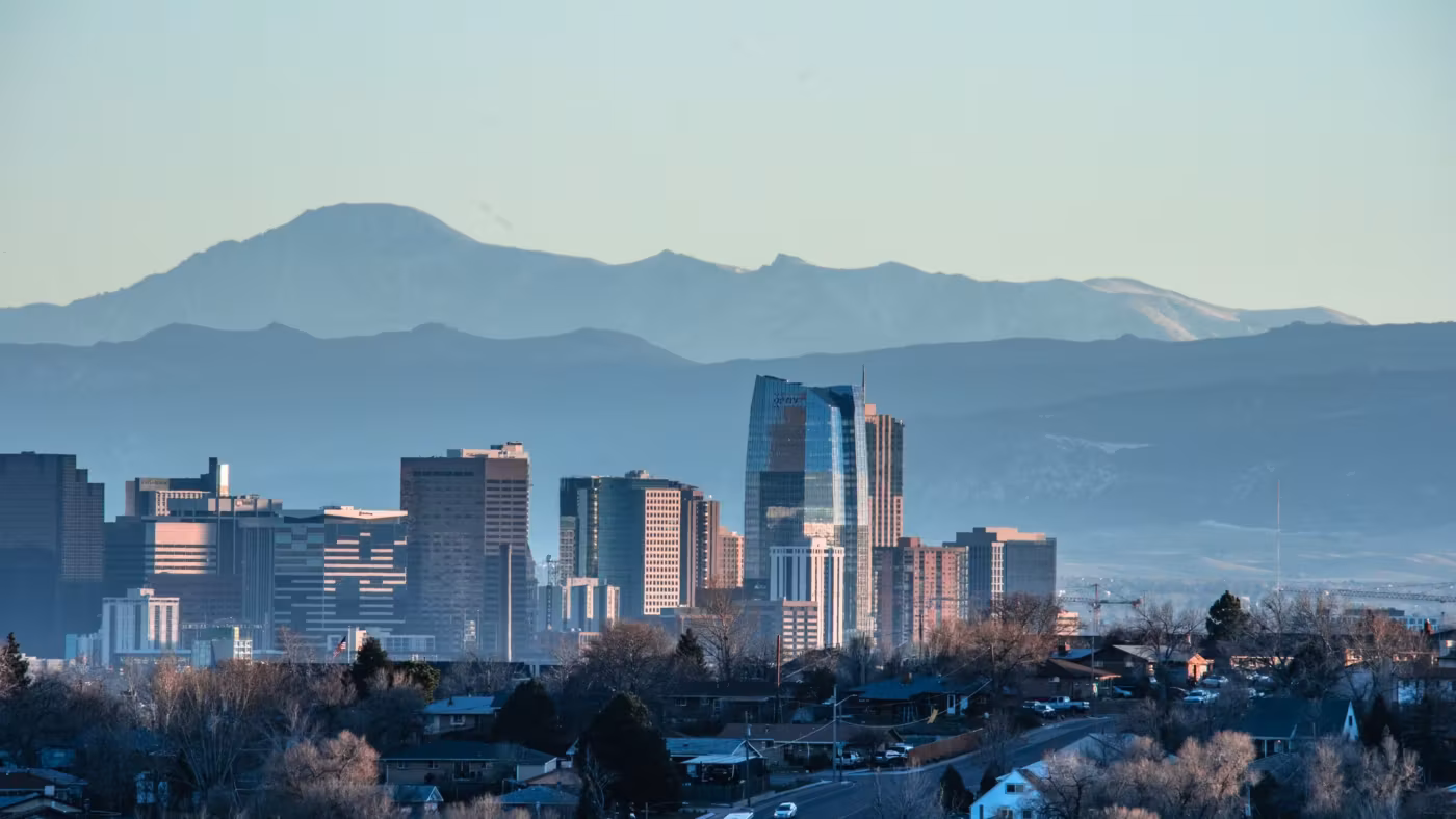 Denver's towers with the mountains of the front range rising behind