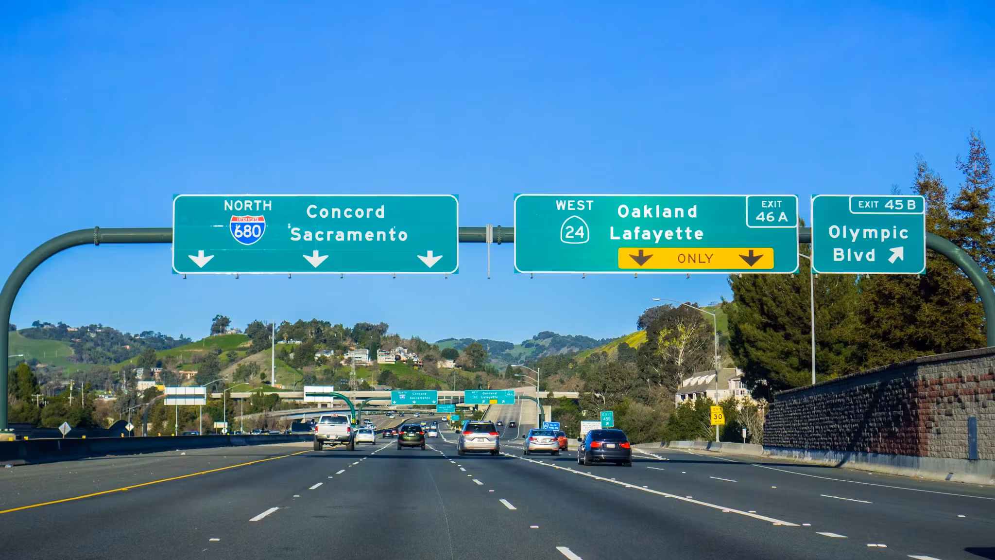 Interstate 680 north with overhead signs for Concord, Sacramento and Oakland