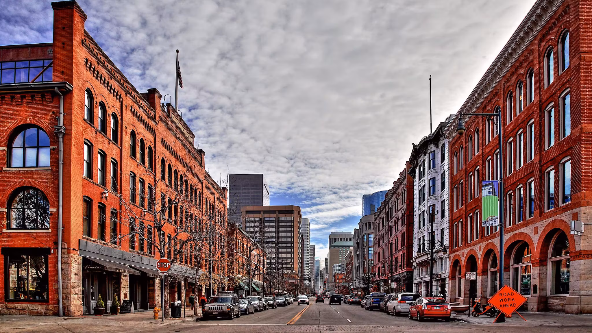 Red-brick warehouse buildings along a street in Denver's lower downtown