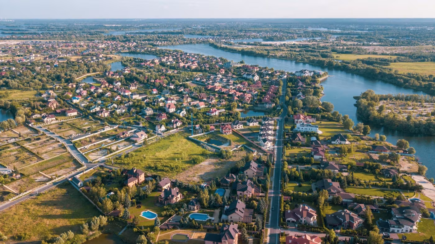 Aerial view of a Houston suburb built around lakes and inlets