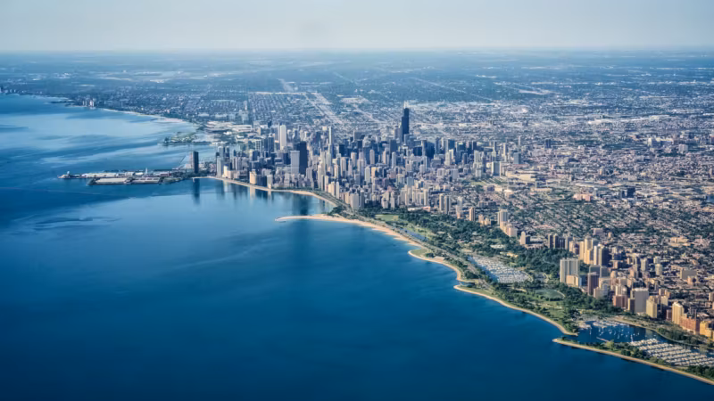 Chicago stretching along the Lake Michigan shore, seen from the air