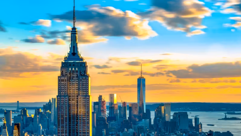 The Empire State Building above the New York skyline at sunset