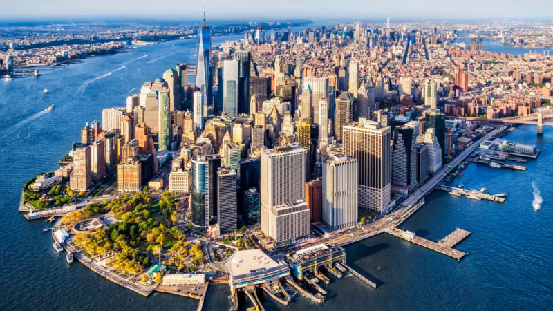 Aerial view of the southern end of Manhattan surrounded by water