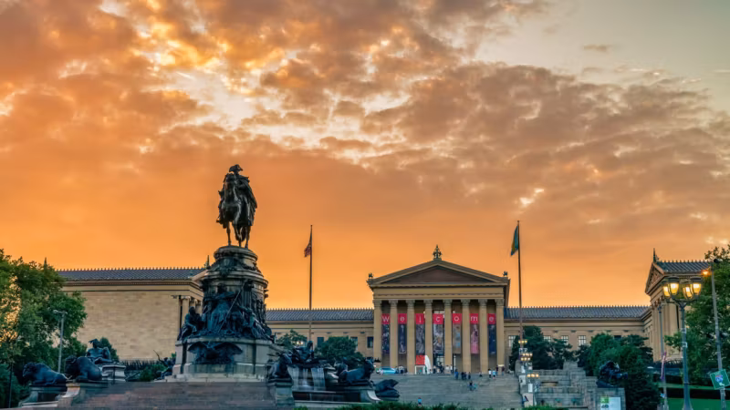 The Philadelphia Museum of Art and the Washington monument at sunset