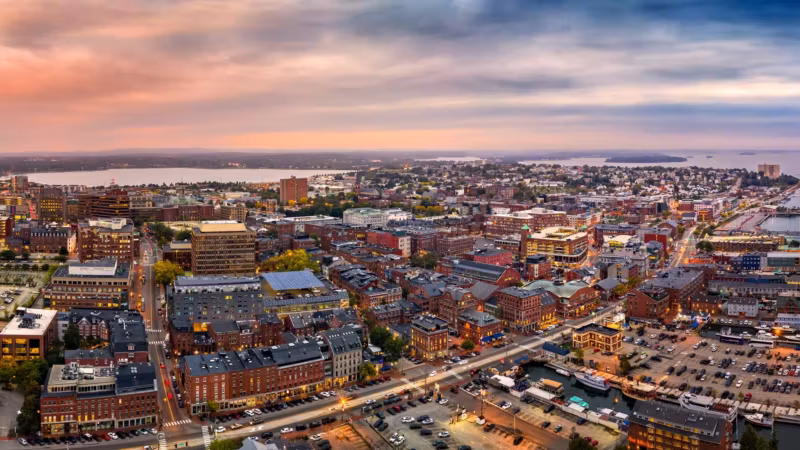 Aerial view of a Portland district of low brick buildings and streets