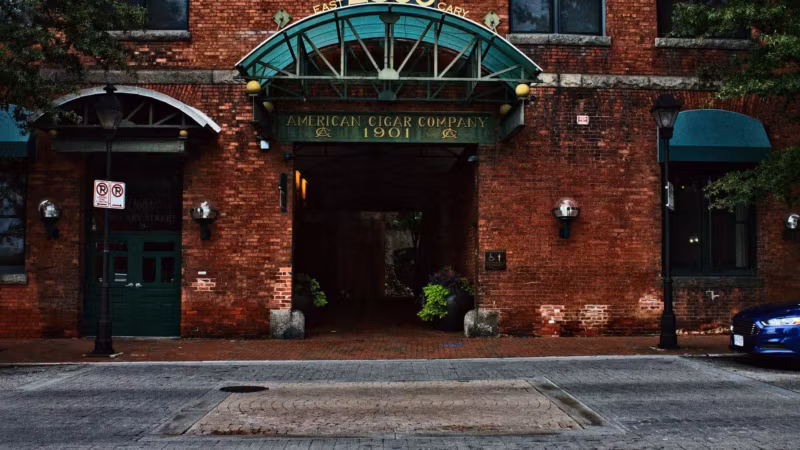 The brick front of the former American Cigar Company building on East Cary Street in Richmond