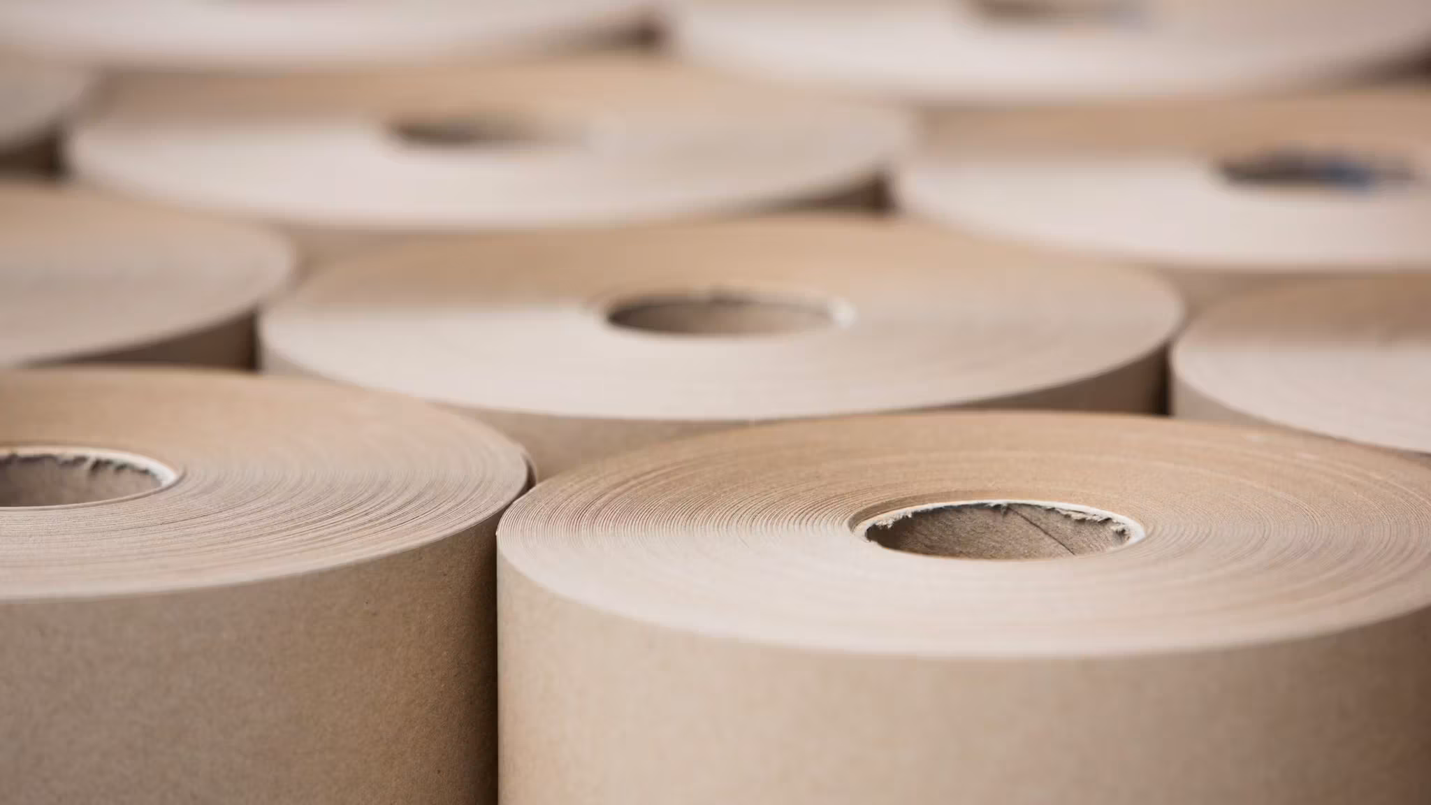 Stacked rolls of gummed paper tape